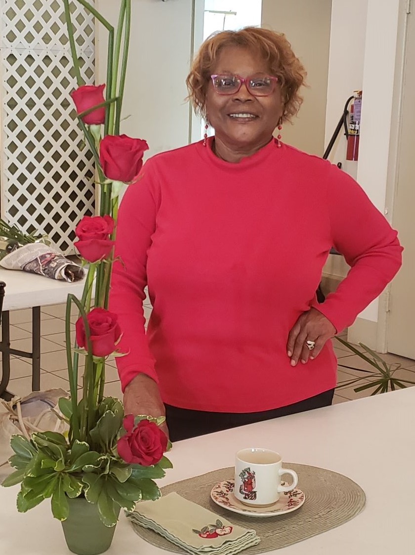 Gwen Carter's signature color is bright red in floral designs 