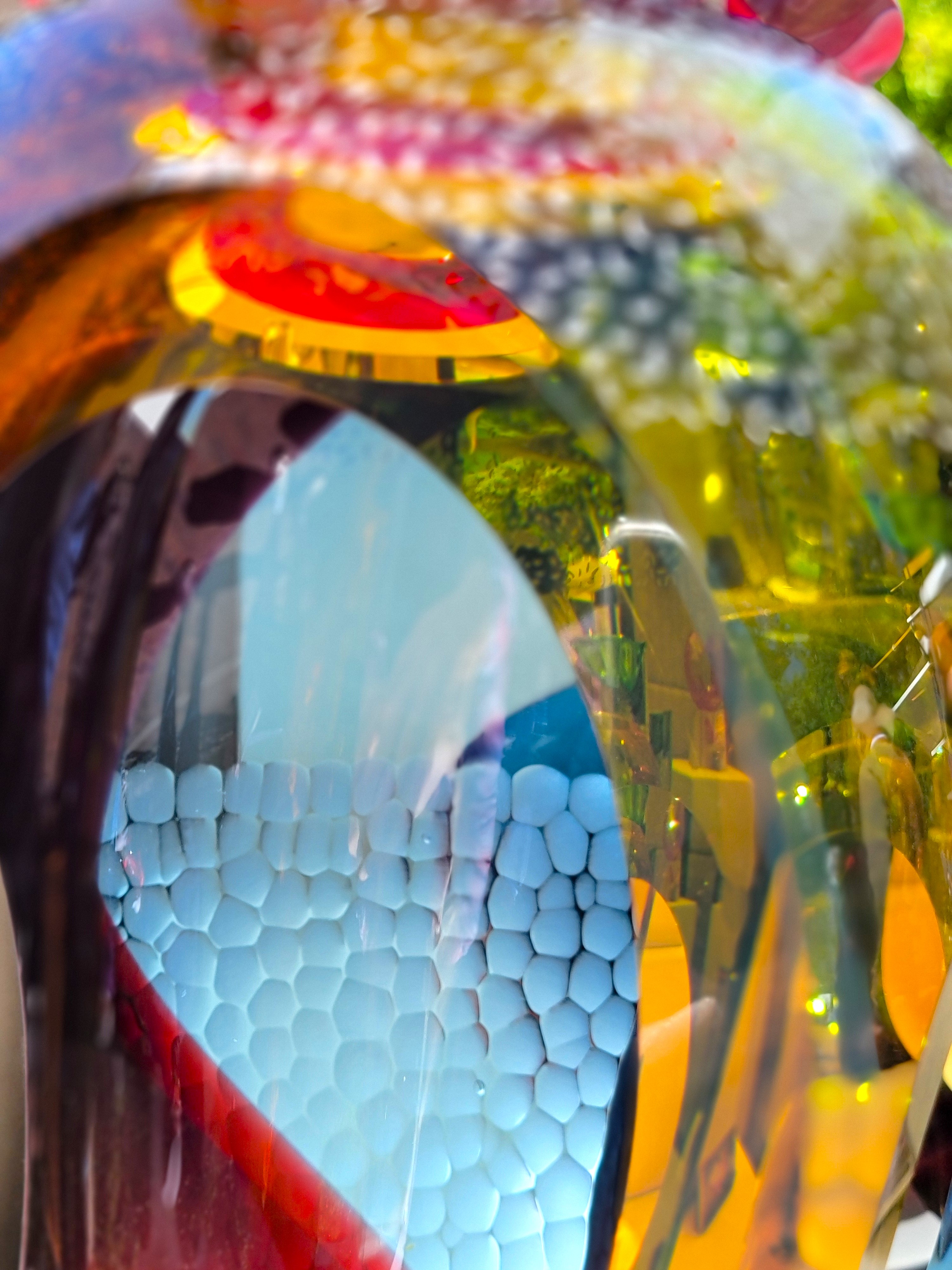 Beveled glass melds with the landscape to reveal new perspectives.