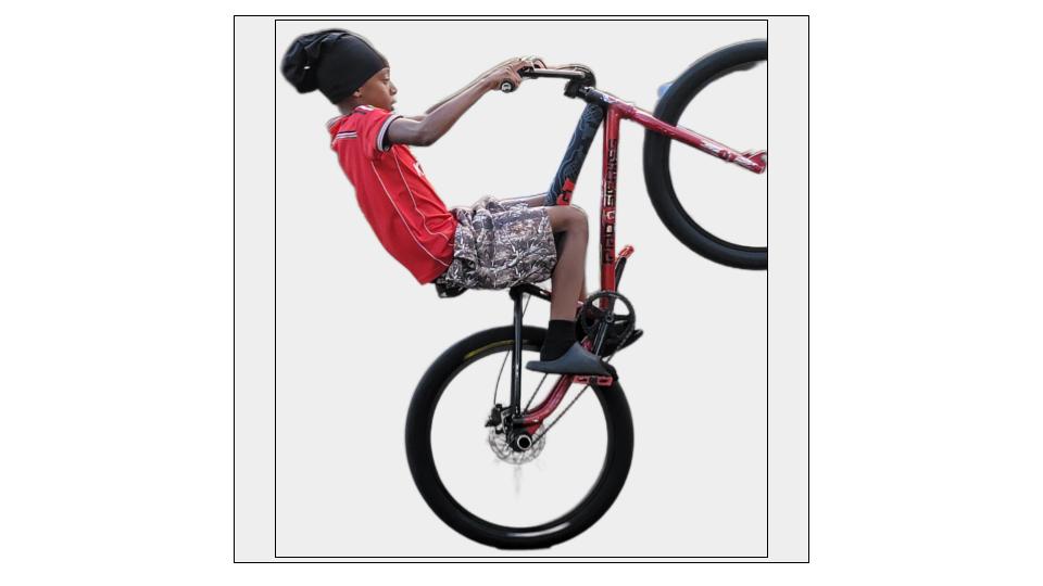 Teen exhibits unusual athleticism with bike stunts.